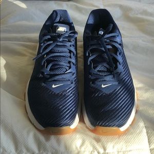 Pair of blue nike sneakers